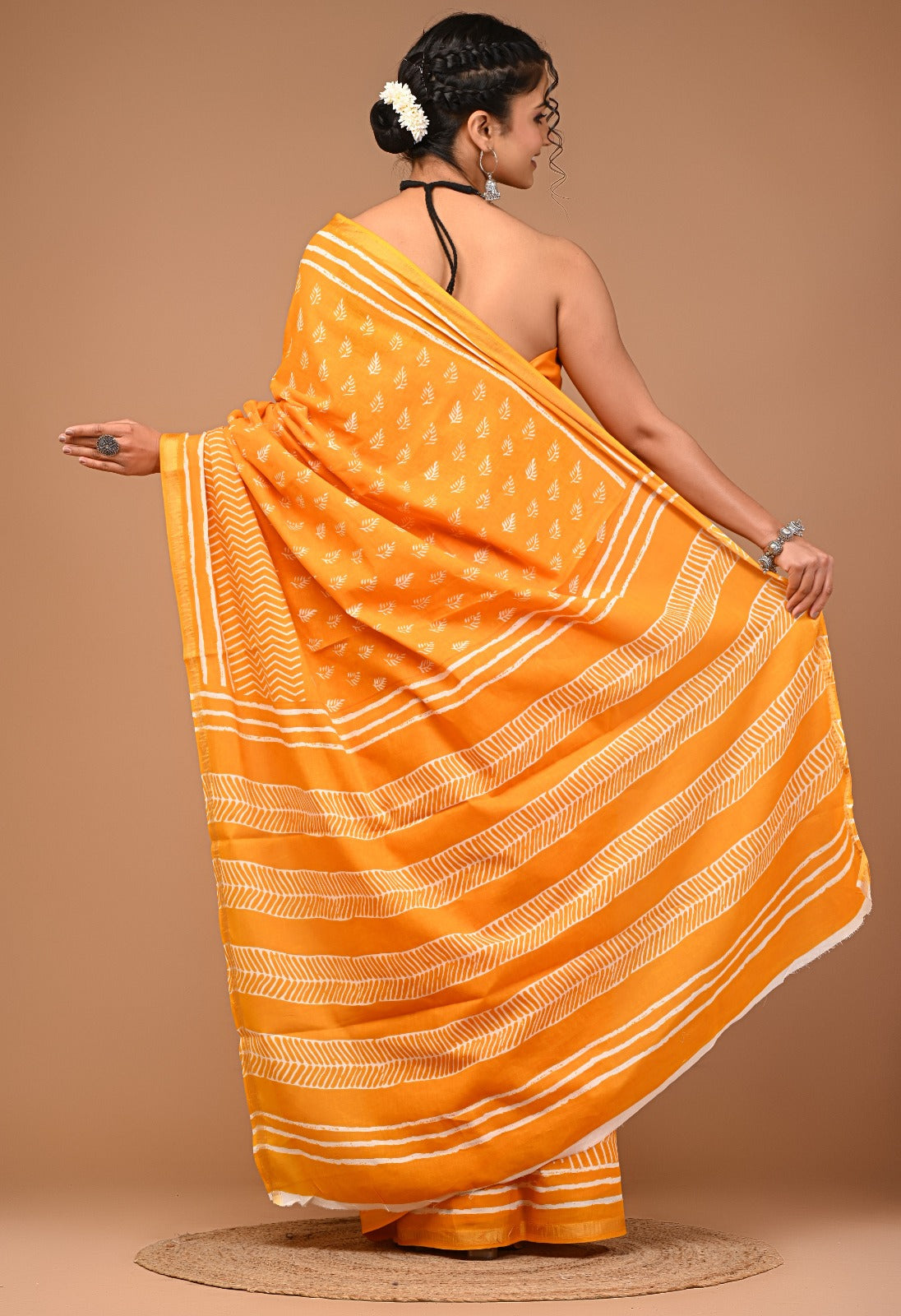 Jodha Ajrakh print zari border saree